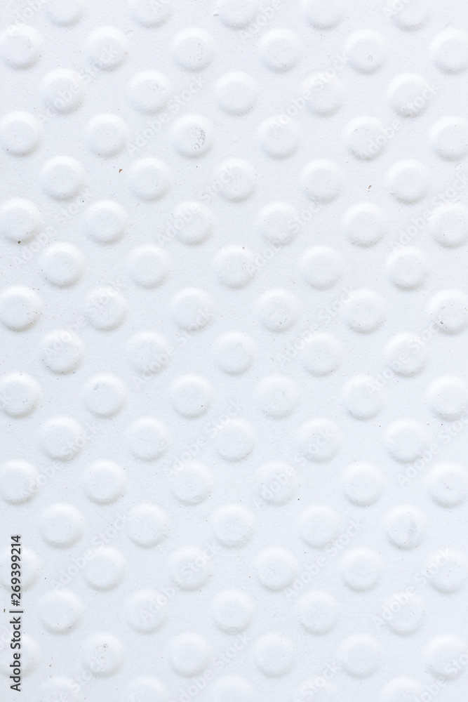 top view of round white pattern texture background on abandoned bathtub for anti slip.