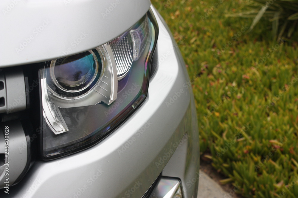 Silver luxury SUV headlight Silver luxury SUV headlight