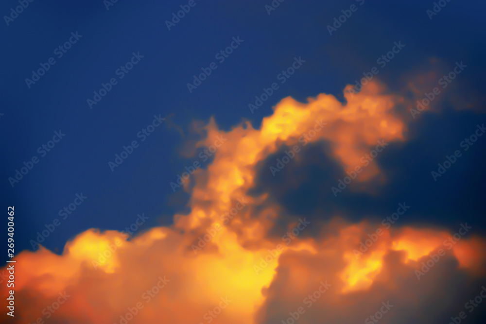 Blurry Background image of dramatic twilight golden clouds on night sky.