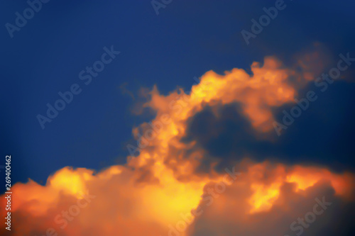 Fototapeta Naklejka Na Ścianę i Meble -  Blurry Background image of dramatic twilight golden clouds on night sky.