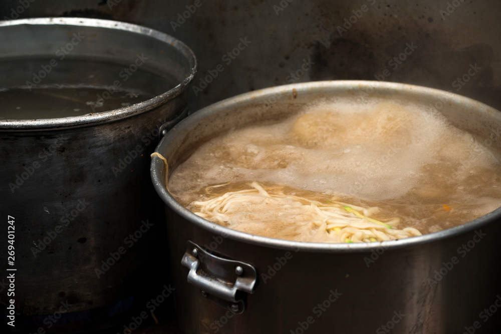 Noodles being cooked on stove, Dongdaemun Market, Seoul, South Korea Noodles being cooked on stove, Dongdaemun Market, Seoul, South Korea