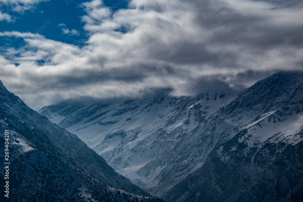 snow on the mountain and clouds snow on the mountain and clouds
