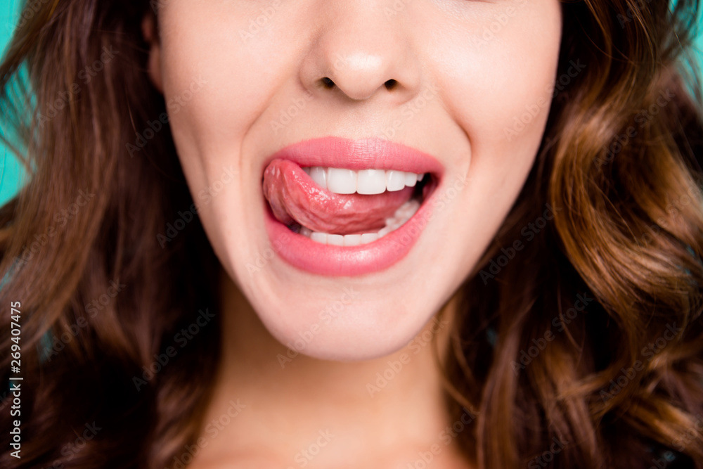 Cropped close-up view portrait of nice cheeky healthy perfect white cheerful cheery wavy-haired girl licking lip isolated over bright vivid shine blue background Cropped close-up view portrait of nice cheeky healthy perfect white cheerful cheery wavy-haired girl licking lip isolated over bright vivid shine blue background