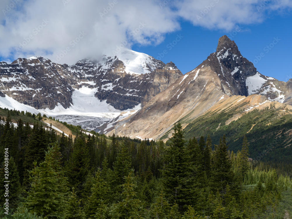Fototapeta premium Clouds over mountains, Icefields Parkway, Jasper, Alberta, Canada