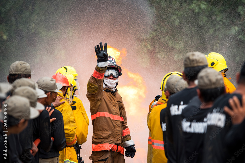 Firefighter Trainer teamwork of Firefighters training, fireman Firefighter Trainer teamwork of Firefighters training, fireman