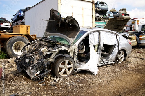 Fototapeta Naklejka Na Ścianę i Meble -  smashing cars at the junkyard car crushing