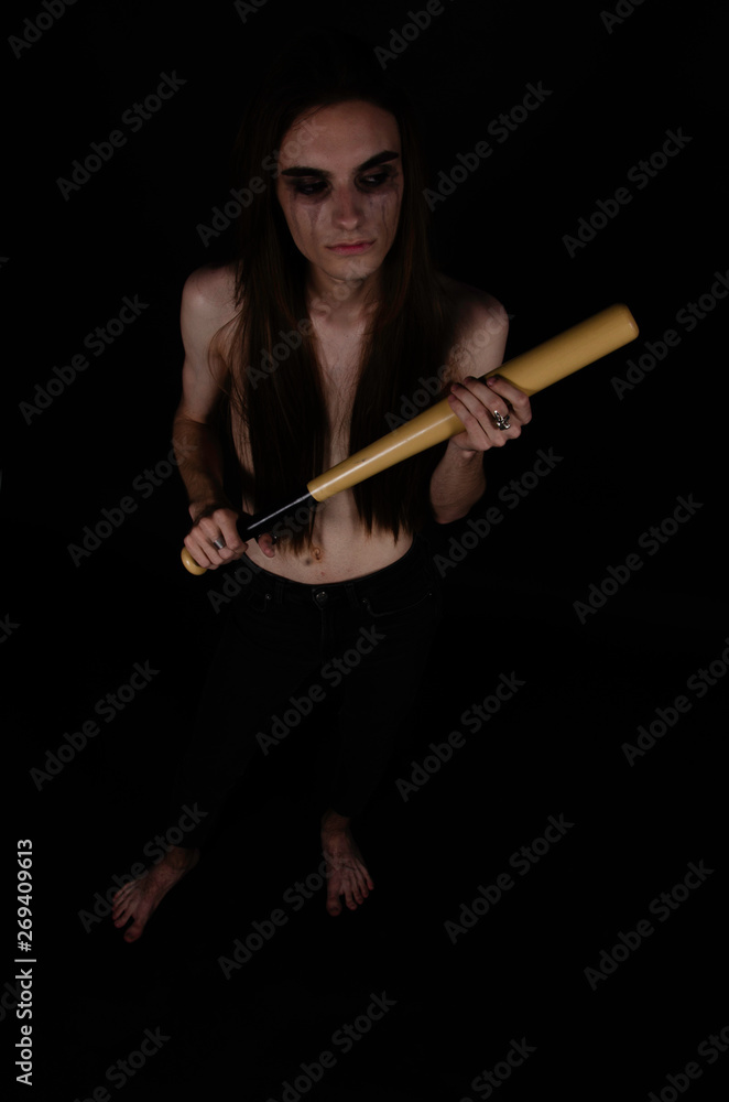 Man with a baseball bat. Punk rock style. Man with a baseball bat. Punk rock style.