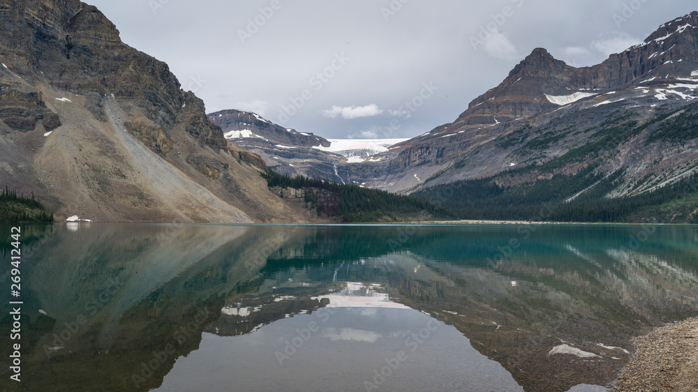 Reflection of mountains in Bow Lake, Improvement District 9, Banff National Park, Jasper, Alberta, Canada Reflection of mountains in Bow Lake, Improvement District 9, Banff National Park, Jasper, Alberta, Canada