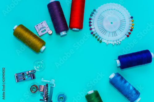 sewing accessories on blue background