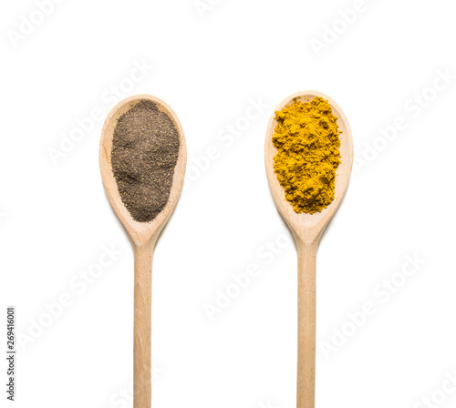 Variety of spices and herbs on wooden table
