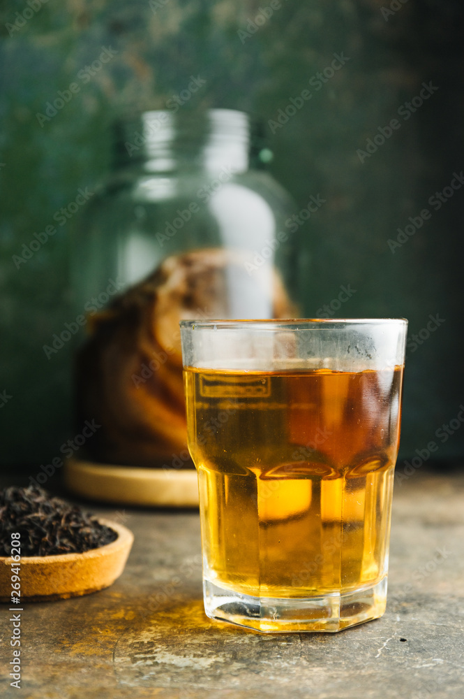 Kombucha tea on rustic background Kombucha tea on rustic background