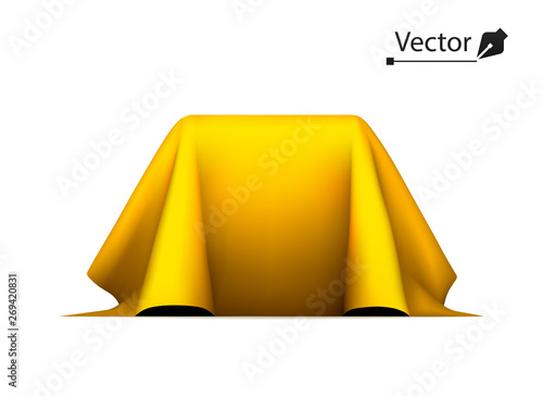 Object covered with golden silk cloth. Empty podium or presentation. Gold, secret box, cube hidden under satin fabric with drapery.
