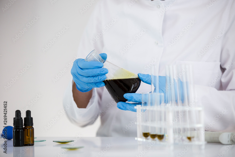 Experimental titration of the CBD oil in a glass bowl Experimental titration of the CBD oil in a glass bowl