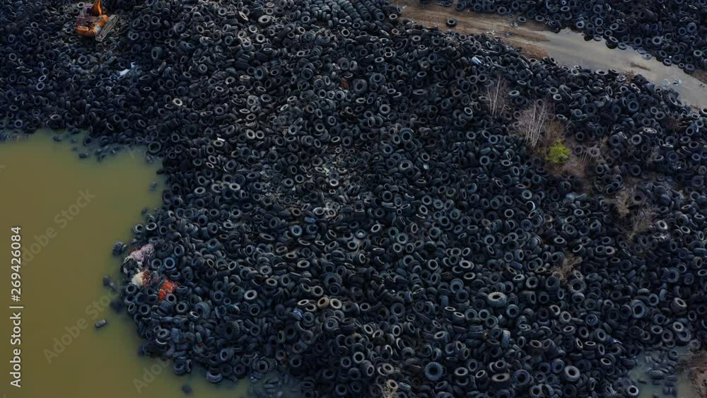 Aerial view of tire landfill. Environmental disaster.