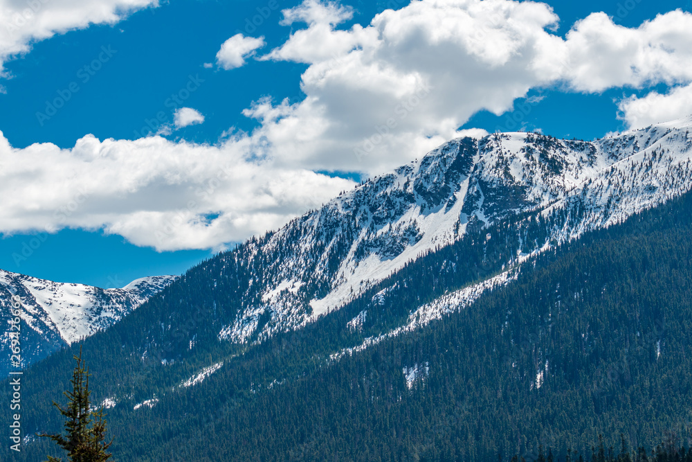 View of snow mountains at summer in British Columbia, Canada. View of snow mountains at summer in British Columbia, Canada.