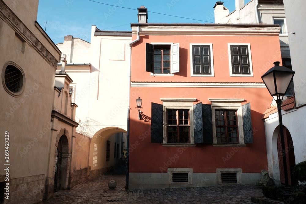 Obraz premium Old architecture small courtyards. Street in the city of Lviv Ukraine 03.15.19
