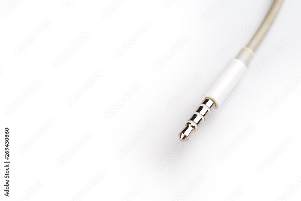 Fototapeta premium Isolated white aux cable on white background
