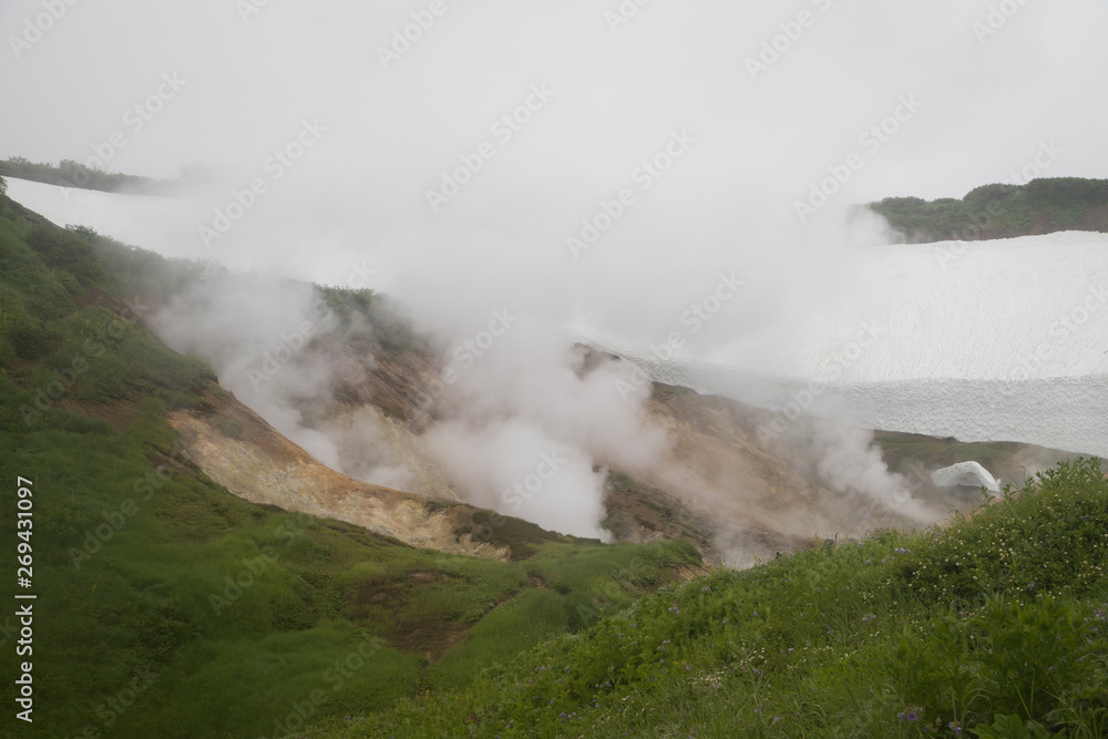 A small valley of geysers near the Mutnovsky geo power station in Kamchatka