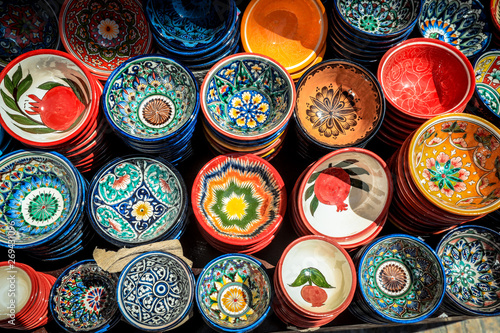 Bukhara, Uzbekistan - May 10, 2019: Bright and Colorful Plates in the Local Uzbek Pattern Style © Dave
