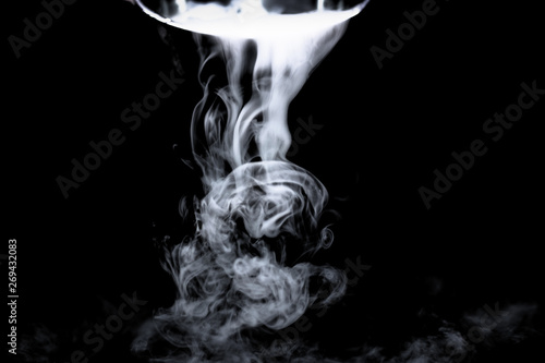 Dry ice smoke Floating in the air, black background