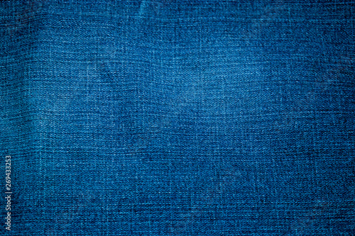 Denim blue and grey fabric in the structural perspective of the image.