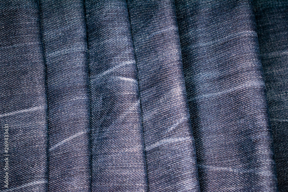 Denim blue and grey fabric in the structural perspective of the image. Denim blue and grey fabric in the structural perspective of the image.