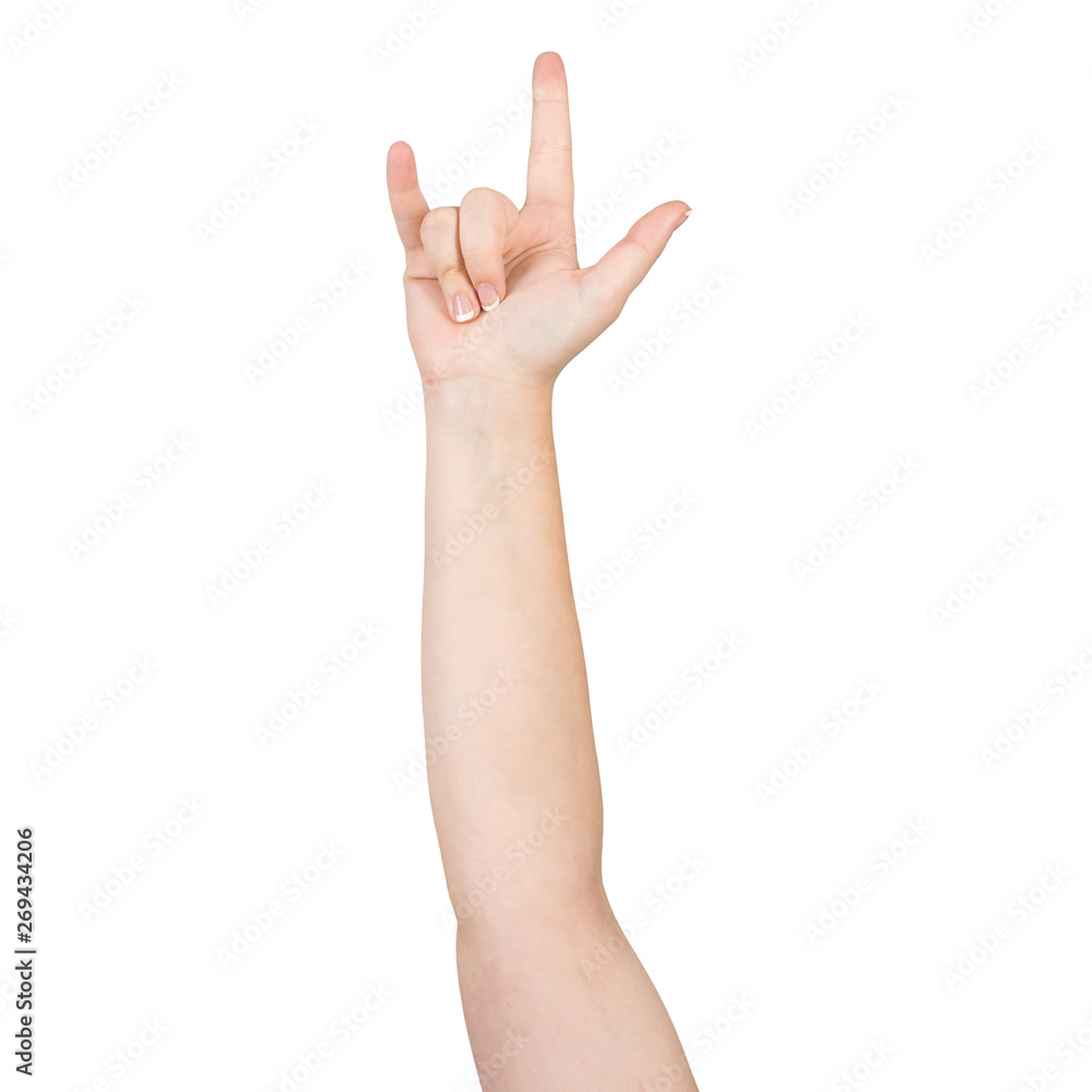 Woman hand showing devil horns gesture Woman hand showing devil horns gesture