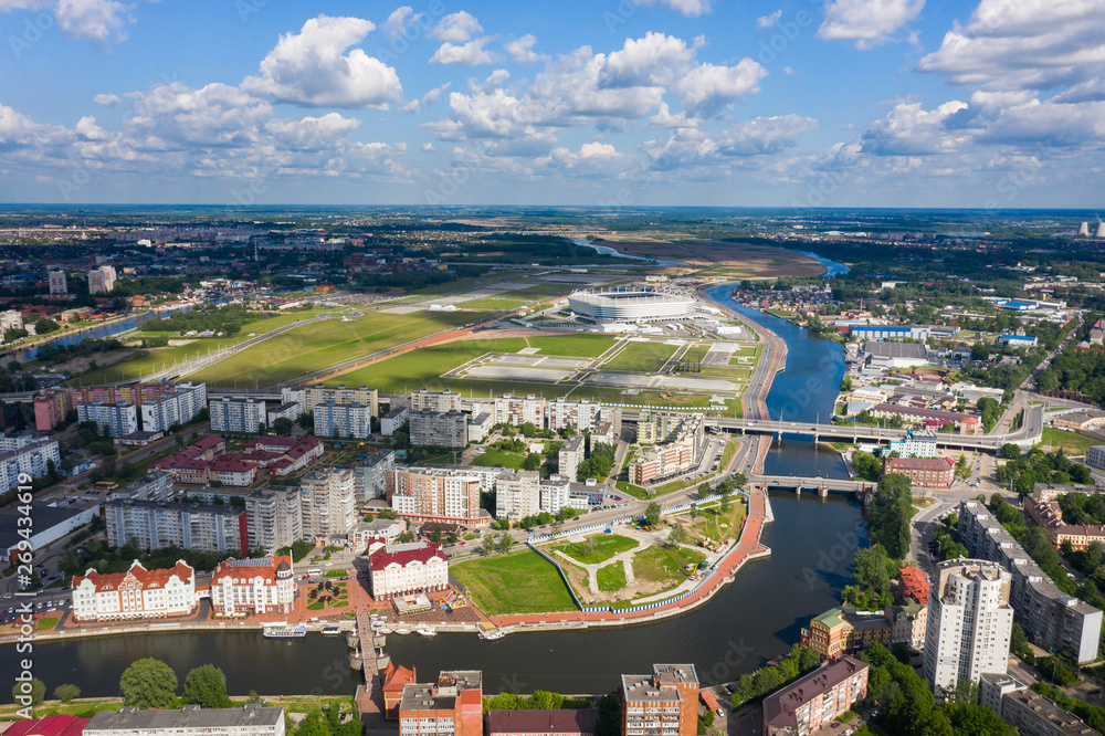 Aerial: The Fishing Village, stadium, river in springtime