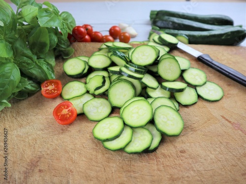 courgettes sliced with cherry and herbs