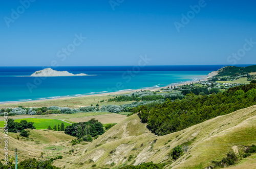 Overlook of Waimarama beach with blue sky above in Hawkes Bay, New Zealand, North Island
