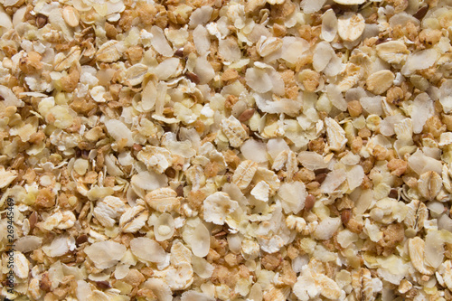 background of a mixture of rice, oat, buckwheat flakes and flax seeds