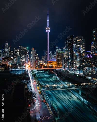 Entire futuristic city skyline view of downtown Toronto Canada. Modern buildings, urban architecture, cars travelling construction and development in a busy city