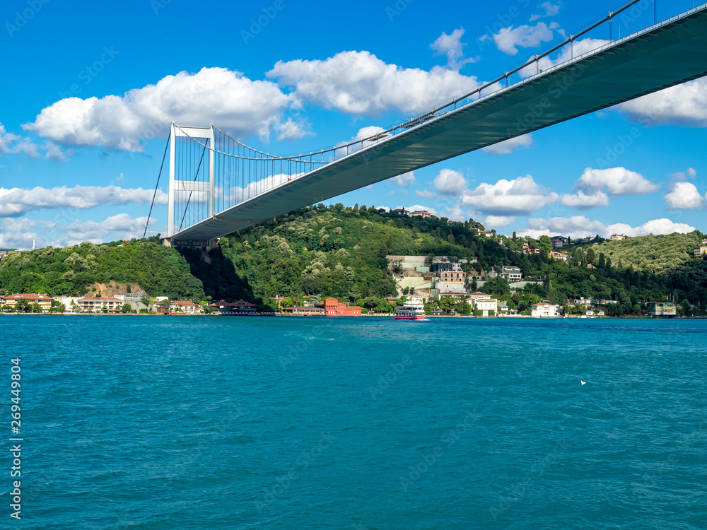 Sea  and bridge view when sunny summer day. Bridge is connected Asia and Europe continents in Tukey