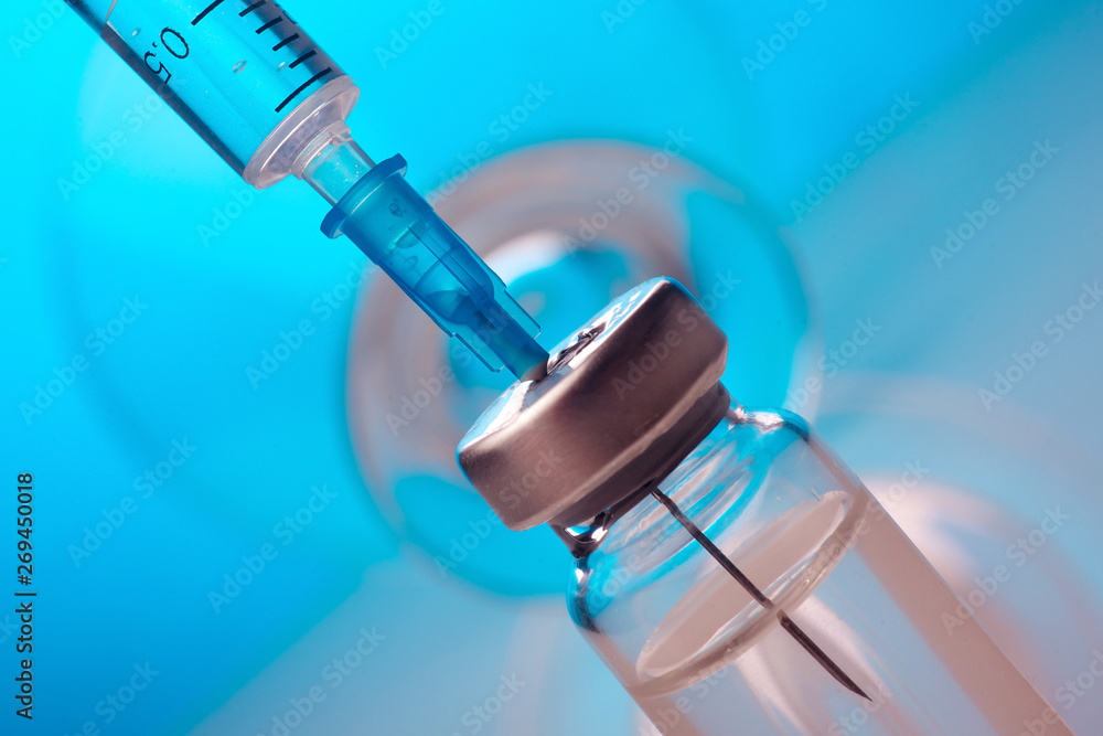 Vaccine vial dose flu shot drug needle syringe,medical concept vaccination hypodermic injection Vaccine vial dose flu shot drug needle syringe,medical concept vaccination hypodermic injection