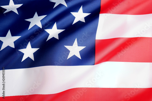 Background of wave flag of the United States of America.