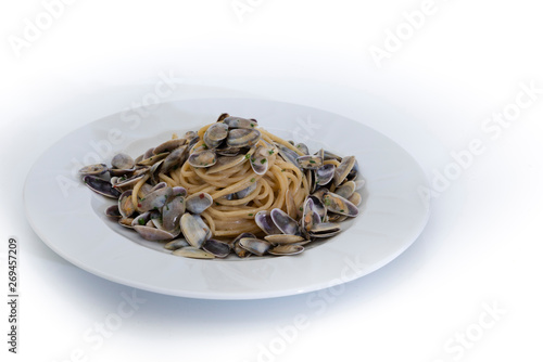 delicious dish of spaghetti and telline, typical Italian food