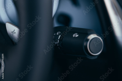 Car integrated turning indicator with headlight switch toggle