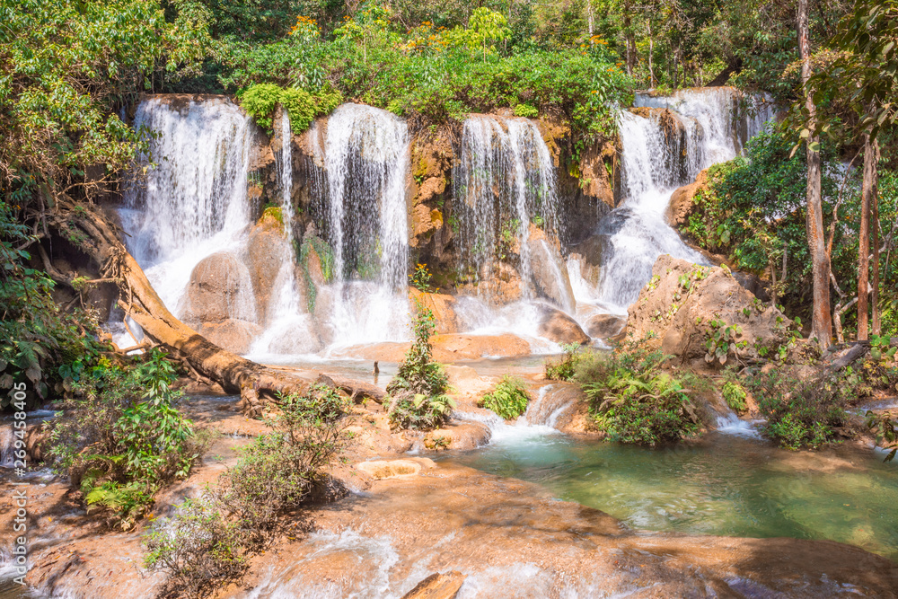 Obraz premium Beautiful turquoise waterfalls in the middle of the jungle of Chiapas in Mexico
