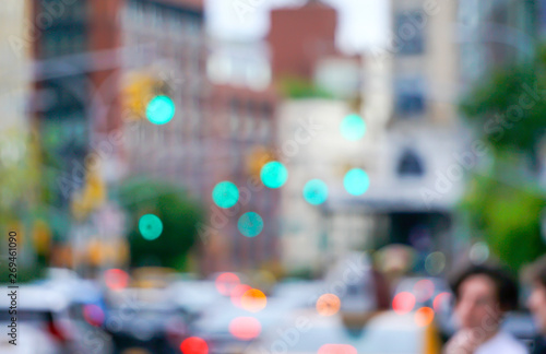 New York city street with traffic lights cars and buildings blurred with bokeh