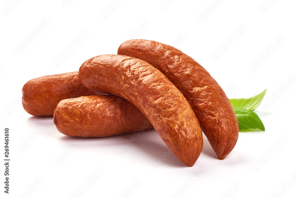 Bavarian Smoked Sausages with basil leaves, dry meat, close-up, isolated on white background Bavarian Smoked Sausages with basil leaves, dry meat, close-up, isolated on white background