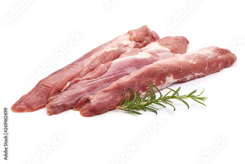 Pork fillet tenderloin with rosemary, raw meat, close-up, isolated on white background