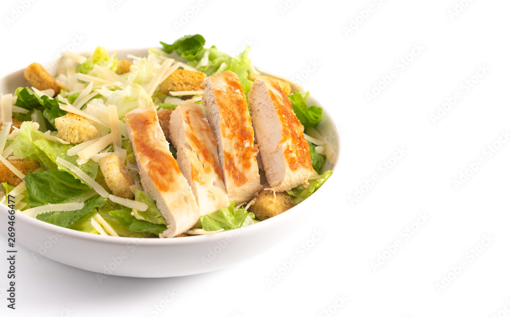 Chicken Caesar Salad Isolated on a White Background Chicken Caesar Salad Isolated on a White Background