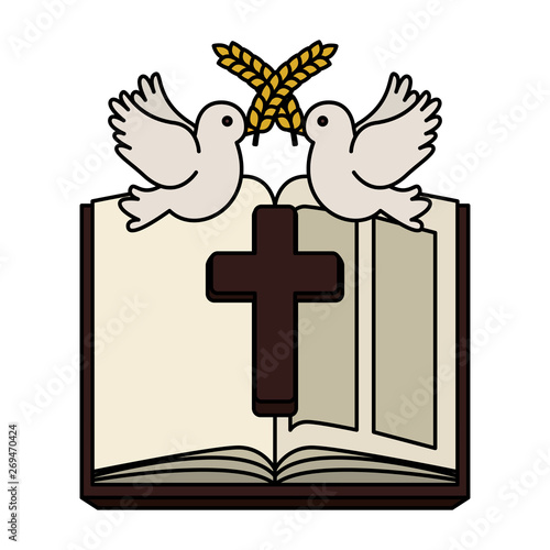 holy bible with wooden cross and doves