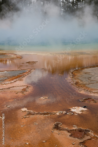 Colorful chemicals of the Grand Prismatic Spring in Yellowstone National Park, Wyoming. Taken during the afternoon in mid-May.