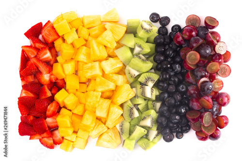Фотография Lines of Rainbow Colored Fruit Isolated on White Background