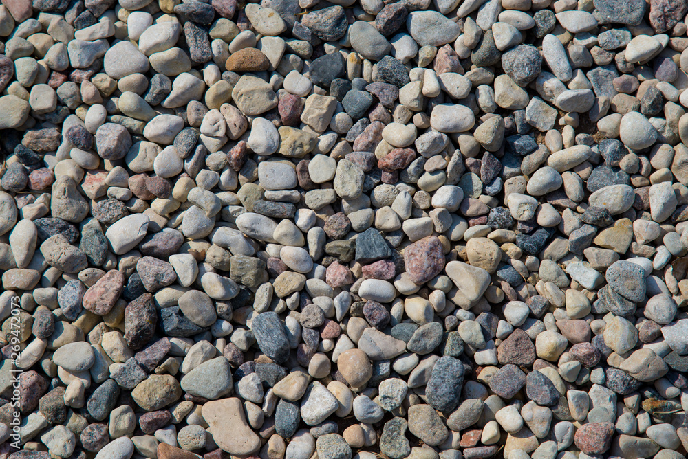 Small sea stones, gravel abstract background. Textures Small sea stones, gravel abstract background. Textures