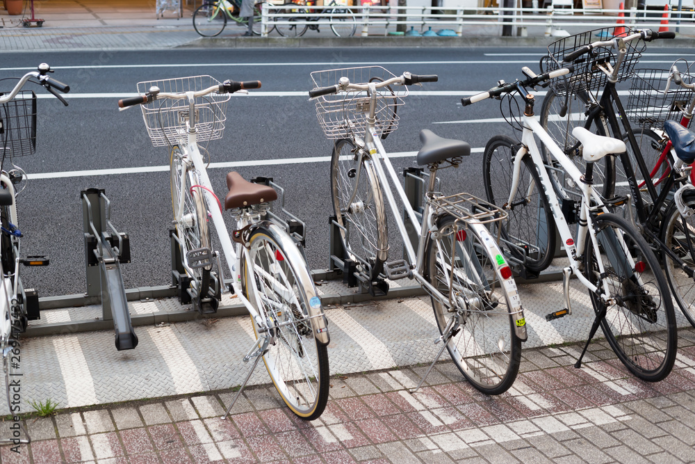 Chiba, japan, 04/02/2019 , Bikes parked on the side of the road in Chiba city.