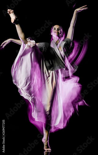 one caucasian woman modern ballet dancer dancing woman studio shot isolated on black bacground