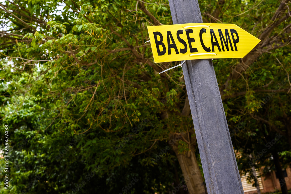 Poster with the word yellow Basecamp with arrow to indicate the location. Poster with the word yellow Basecamp with arrow to indicate the location.