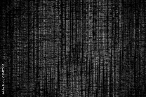 Black linen fabric texture or background.